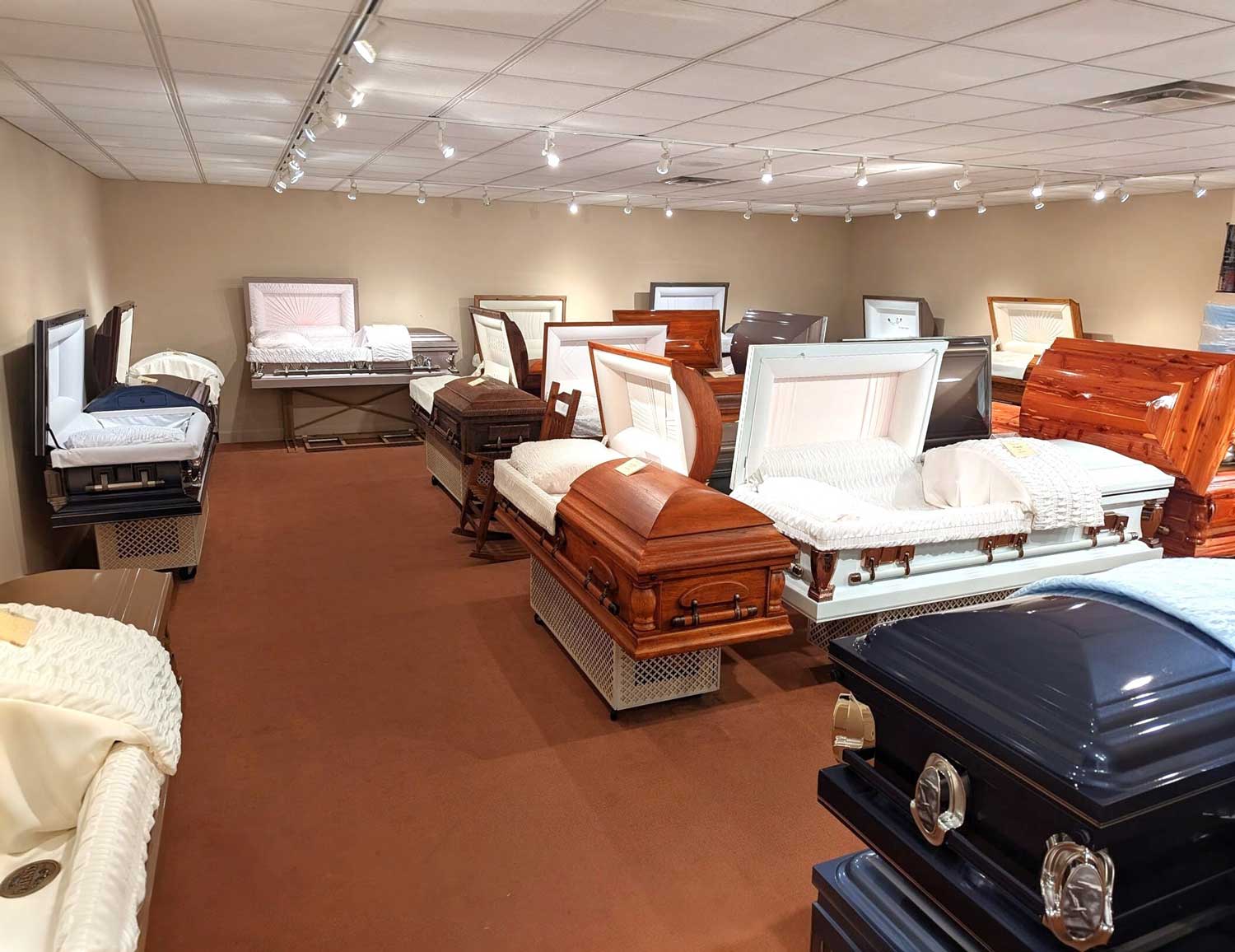 The casket room with selection of different caskets on display.